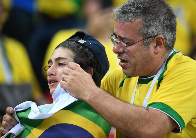 Fans of Brazil are seen after the 2018 FIFA World Cup quarter-final match between Brazil and Belgium in Kazan, Russia, July 6, 2018. Photo Xinhua by Du Yu.