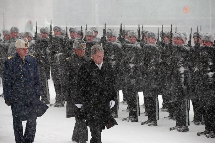  President Sauli Niinistö inspects the guard of honor in front of the Parliament Building on Feb.1, 2018. Photo Xinhua by Matti Matikainen.