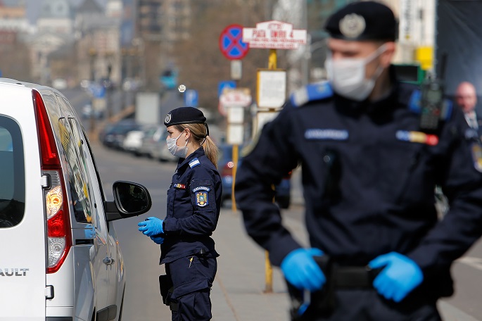 18 Afghan refugees hidden in trucks held at Romania border